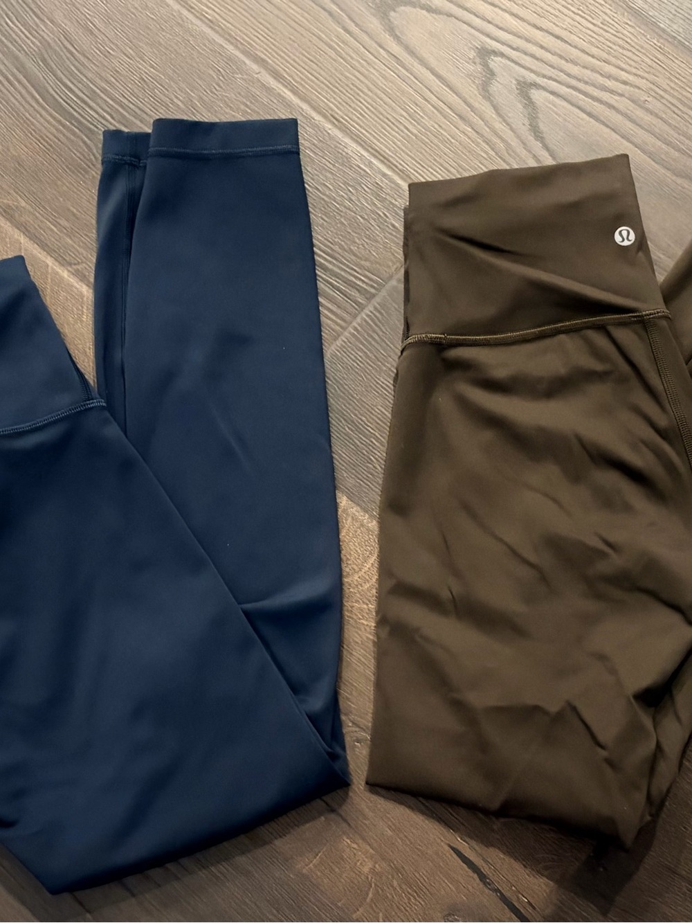 lululemon athletica High-Rise Leggings in teal and olive.
